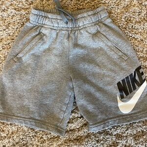 Nike Boys sweat shorts in size small. Excellent condition.